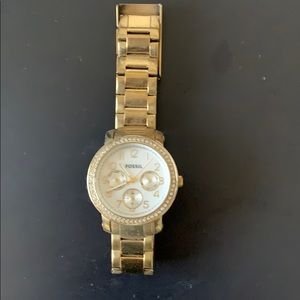 Gold fossil watch